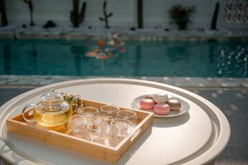 glass of champagne and cake on table