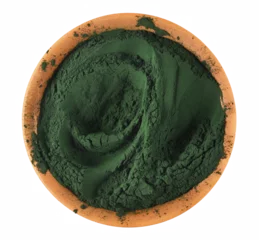 Poster Organic spirulina powder in clay pot isolated on white, top view © dule964