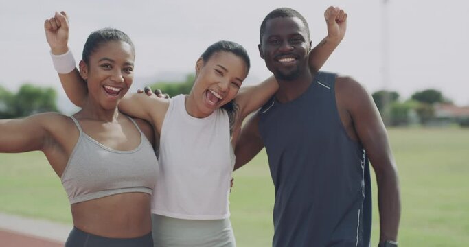 Happy people, fitness and runners in celebration for teamwork, winning or success on stadium track. Group portrait of diverse athletes or friends smile for outdoor workout, exercise or fist in nature