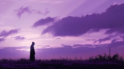 Zelfklevend Fotobehang Silhouette of a person at dusk under purple sky - A tranquil scene capturing the silhouette of a solitary figure against a dramatic purple sky at dusk, invoking a sense of contemplation © Mickey