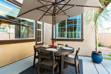 table with umbrella patio