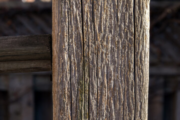An old weathered wooden post.