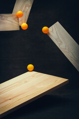 Abstract still life with balls on a wooden board
