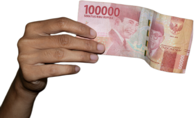 hand holding an isolated one hundred thousand rupiah note with no background. business and finance concepts 