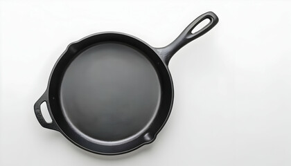 Empty cast iron frying pan over white background, view from above. Food background