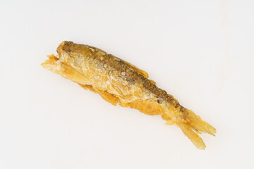 Fried small river fish on white background