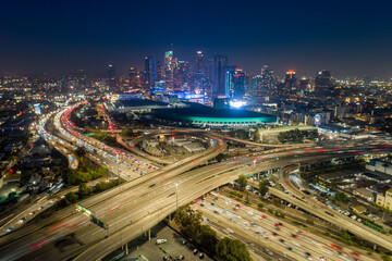 Downtown Los Angeles at night with rush hour traffic.