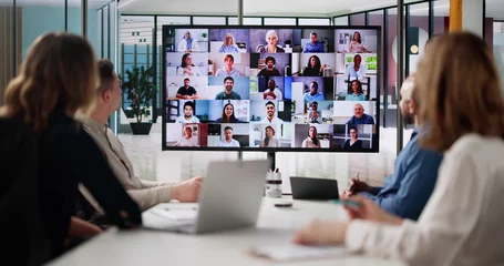 Fotobehang Group Of Businesspeople Having Video Conference © Andrey Popov