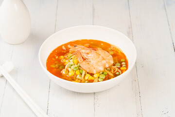 Special Chinese shrimp soup bamboo noodles on simple background