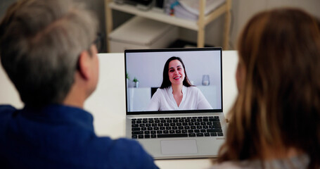 Couple Video Conferencing With Their Happy Daughter - 765151898