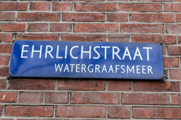 Obraz premium Close Up Erlichstraat Street Sign At Amsterdam The Netherlands 13-3-2024