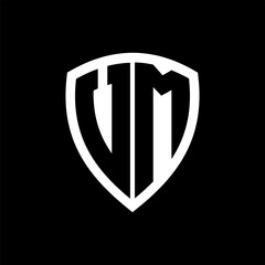 VM monogram logo with bold letters shield shape with black and white color design