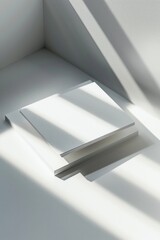 A stack of books on a white table, perfect for educational or office concepts