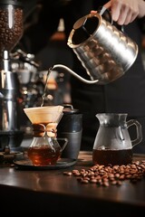 l café dorado gotea en una jarra, un ritual de precisión y paciencia de un barista, creando una obra maestra de grano a brebaje en la alquimia del amanecer.