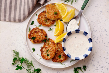 Norwegian fish cakes with tartar sauce.top veiw