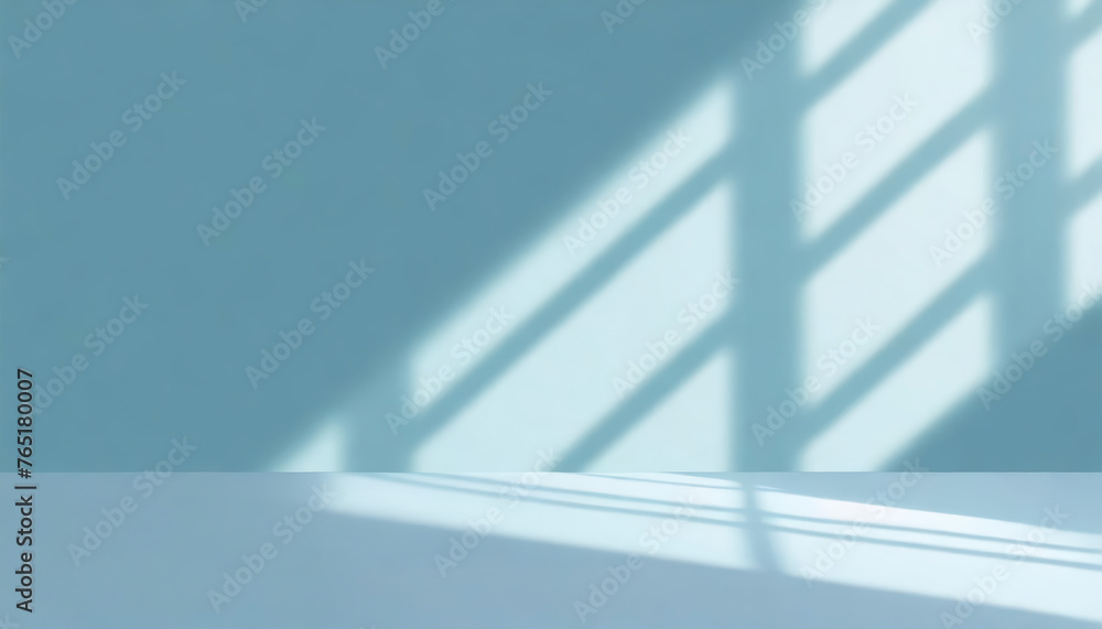 Poster abstract minimal light grunge blue background for product presentation. Shadow and light from windows on plaster wall.