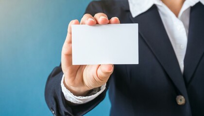 Businesswoman holding a Blank Business Card - Empty Business Card for Mockup - Template for Logo Design and Branding - Representation of Succesful Person