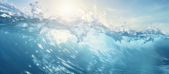 Fototapeta na wymiar Sunlit ocean wave breaking close up