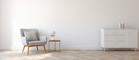 Room with white wall featuring chair and table
