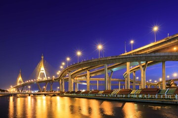 Fototapeta na wymiar Curve Expressway By River Bangkok Night