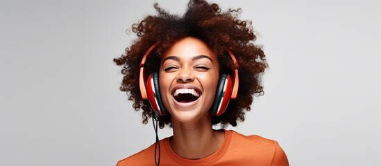 An animated woman wearing headphones is laughing hysterically and joyfully