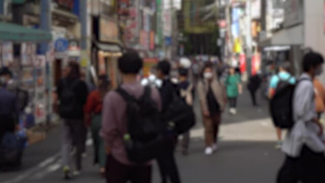 Blurred People, Anime, and Manga Stores in Akihabara in Tokyo