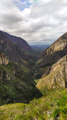 Huge canyon formed by very high vertical walls, inside it runs a river that forms some waterfalls. It is located in Serra do Cipó, Brazil