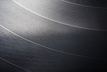 Close-up shot of 12-inch LP vinyl record groove.
