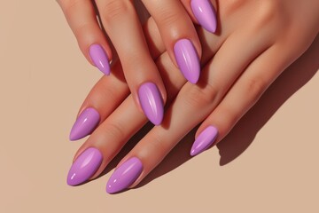 Beautiful lavender nails on beige background  salon concept.