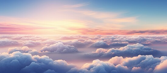 A serene view of a sunset casting vibrant colors over a sky filled with fluffy white clouds - obrazy, fototapety, plakaty