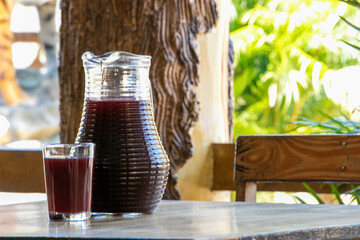 Purple chicha on a restaurant table