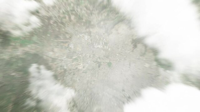 Earth zoom in from space to Zapopan, Mexico. Followed by zoom out through clouds and atmosphere into space. Satellite view. Travel intro. Images from NASA