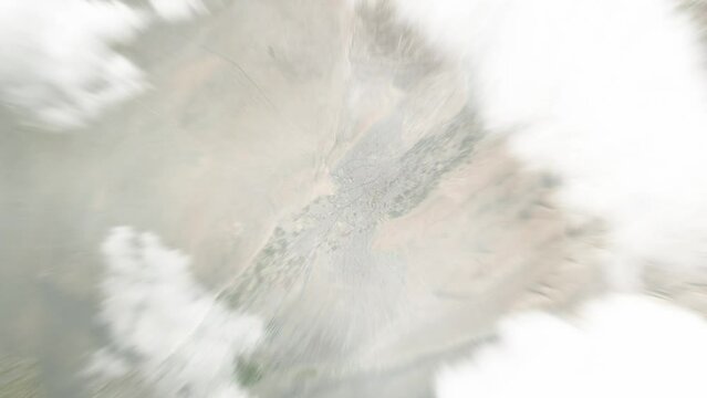 Earth zoom in from space to Tacna, Peru. Followed by zoom out through clouds and atmosphere into space. Satellite view. Travel intro. Images from NASA