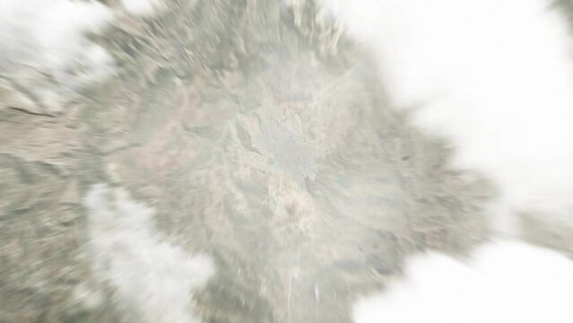 Earth zoom in from space to Potosi, Bolivia. Followed by zoom out through clouds and atmosphere into space. Satellite view. Travel intro. Images from NASA