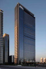Fototapeta na wymiar Architectural Splendor of the JW Marriott Building — Luxurious Hospitality in an Urban Landscape