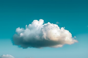 A large white cloud in a blue sky - obrazy, fototapety, plakaty