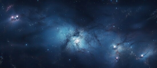 Obraz premium Capture of a vast galaxy filled with twinkling stars against a deep blue sky