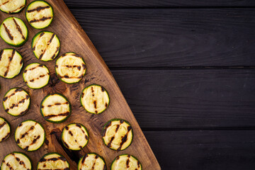 Healthy vegetarian food . Grilled green zucchini .