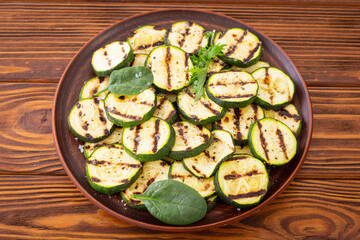 Healthy vegetarian food . Grilled green zucchini .