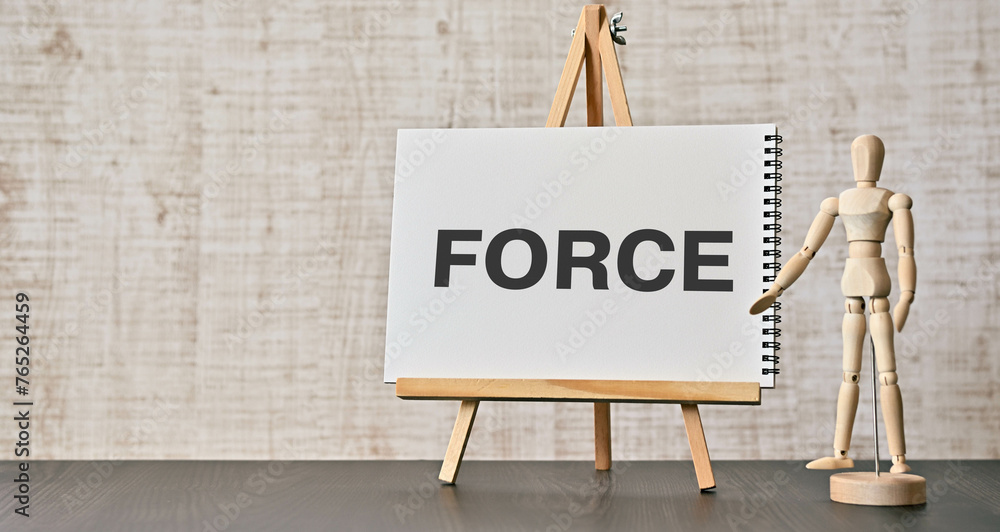 Poster there is notebook with the word force. it is as an eye-catching image.