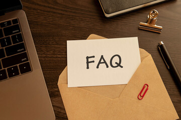 There is word card with the word FAQ. It is an abbreviation for Frequently Asked Questions as...