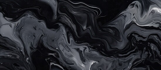 Obraz premium A detailed view of a black and white marble design on a dark background