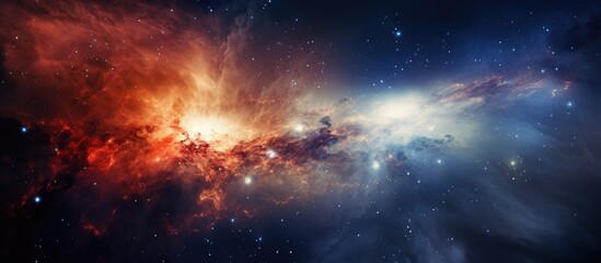 The red and blue galaxy forms a stunning landscape in space, surrounded by a multitude of stars....
