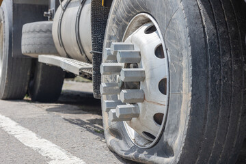 close-up of flat truck tire 