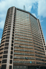 Fototapeta premium The ancient Cocoa House located in Dugbe, a major commercial area in Ibadan, Oyo, Nigeria on March 22, 2024. The first skyscraper in West Africa built from proceeds of Cocoa, Rubber and Timber
