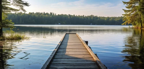 Gartenposter wooden pier in lake © Image Studio