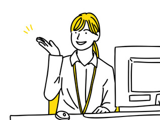 PCの前でオフィスワーク中の女性