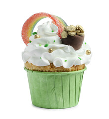 St. Patrick's day party. Tasty cupcake with sour rainbow belt and pot of gold toppers isolated on white