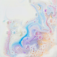 Colorful soapy foam, abstract and bubbly, suggests cleanliness and washing.