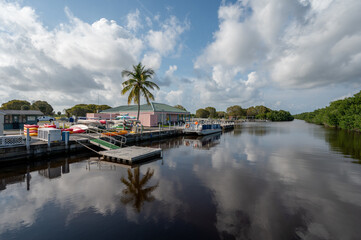 Fototapeta premium Flamingo Marina in Everglades National Park, Florida under sunny March cloudscape.